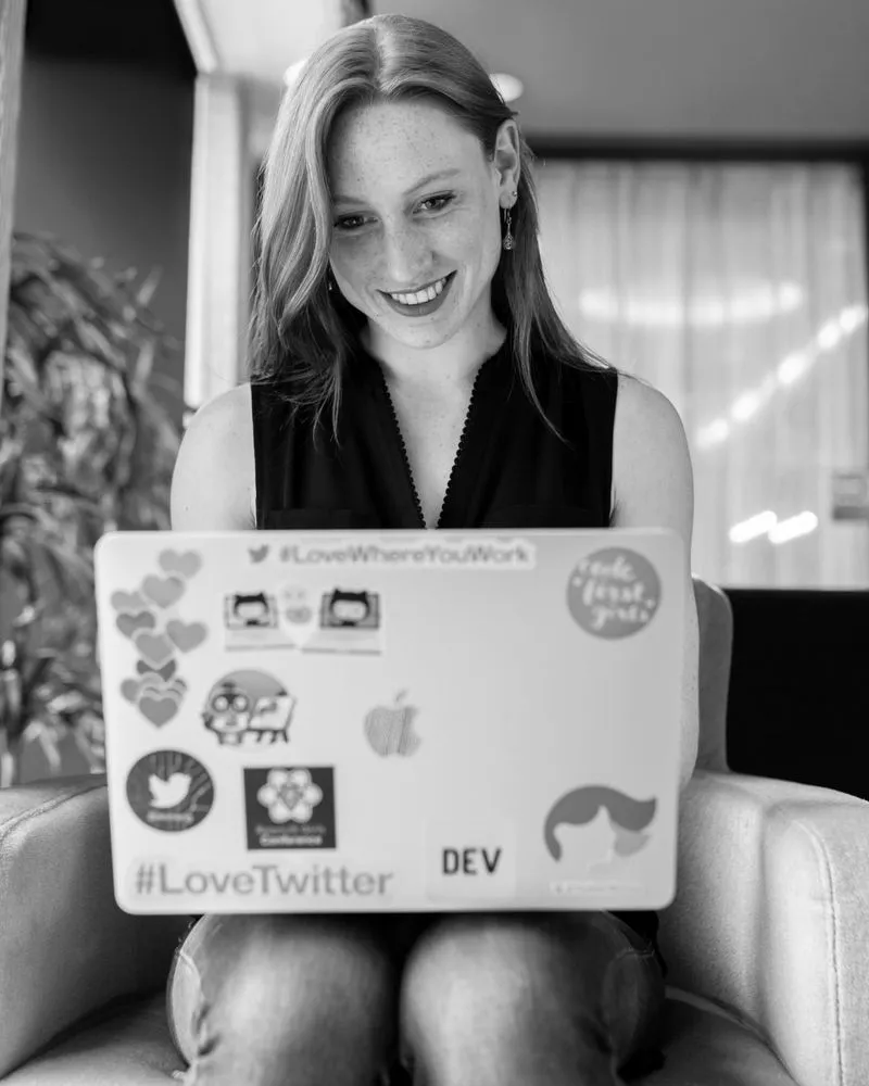 Women sitting with laptop on lap